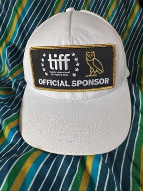TIFF Official Sponsor White Baseball Cap with Gold Embroidery
